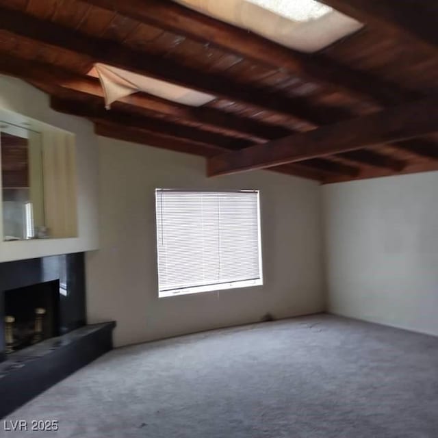 1413 Bryn Mawr Ave, Las Vegas, NV 89102 - unfurnished living room with wooden ceiling, a fireplace with raised hearth, and carpet