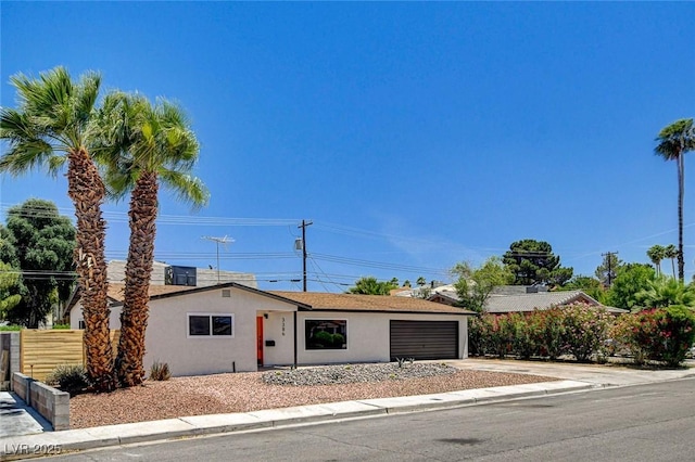 3386 El Camino Real, Las Vegas, NV 89121 - single story home featuring stucco siding, concrete driveway, and an attached garage