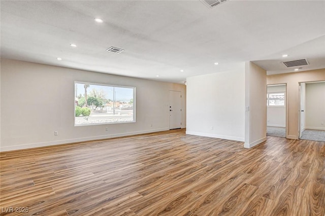 3386 El Camino Real, Las Vegas, NV 89121 - spare room featuring wood finished floors, healthy amount of natural light, baseboards, and recessed lighting