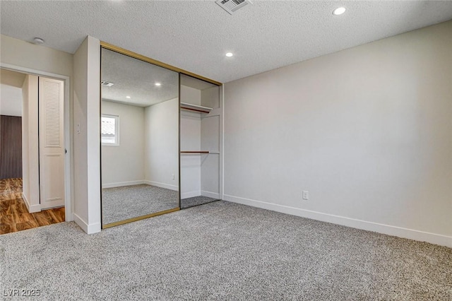 3386 El Camino Real, Las Vegas, NV 89121 - unfurnished bedroom featuring carpet floors, baseboards, a closet, recessed lighting, and a textured ceiling