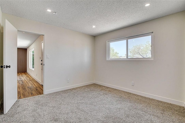 3386 El Camino Real, Las Vegas, NV 89121 - empty room with carpet floors, recessed lighting, baseboards, and a textured ceiling