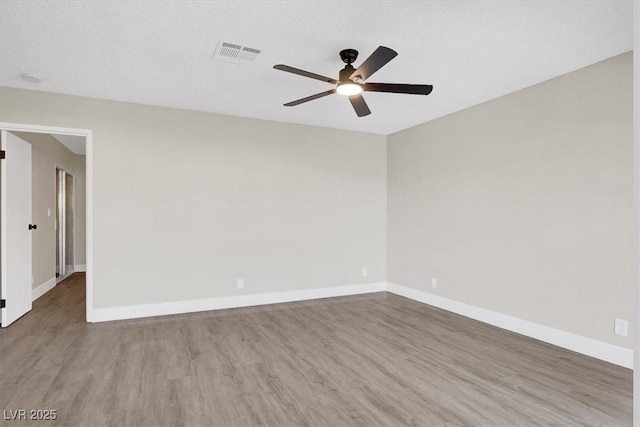 417 N Lamb Blvd Unit E, Las Vegas, NV 89110 - spare room with wood finished floors, ceiling fan, and baseboards