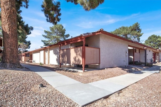 417 N Lamb Blvd Unit E, Las Vegas, NV 89110 - view of side of property with stucco siding