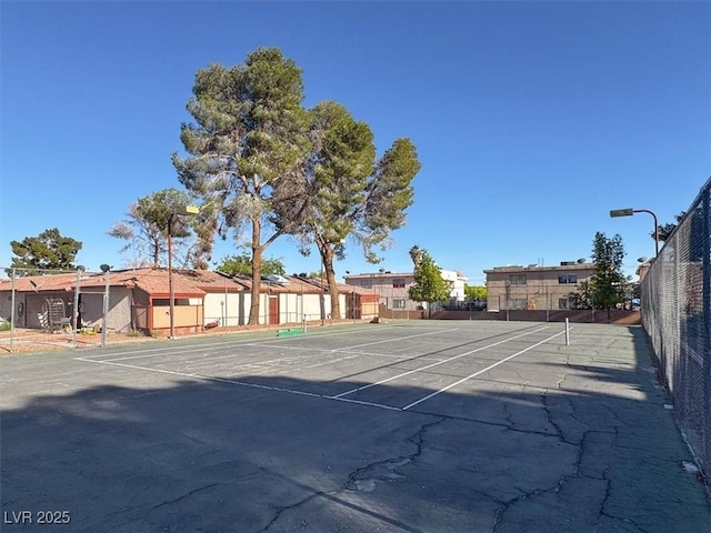 417 N Lamb Blvd Unit E, Las Vegas, NV 89110 - view of tennis court featuring a residential view