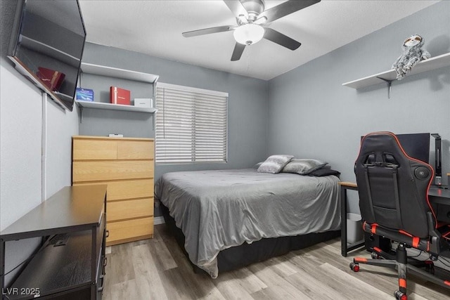 5937 Round Castle St, Las Vegas, NV 89130 - bedroom featuring wood finished floors, ceiling fan, and an office area