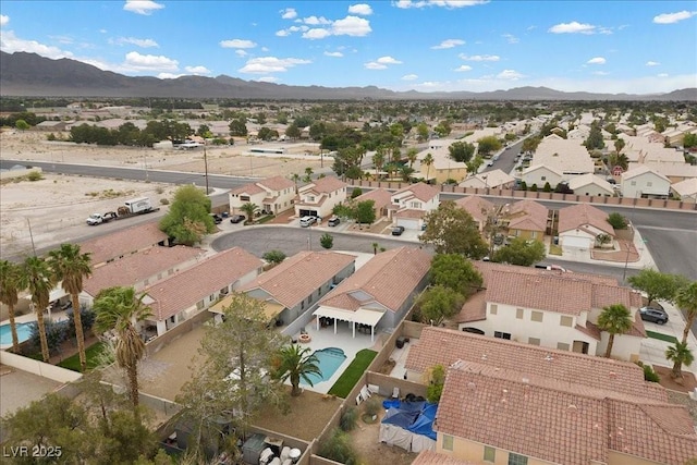 5937 Round Castle St, Las Vegas, NV 89130 - aerial view of residential area with a mountainous background