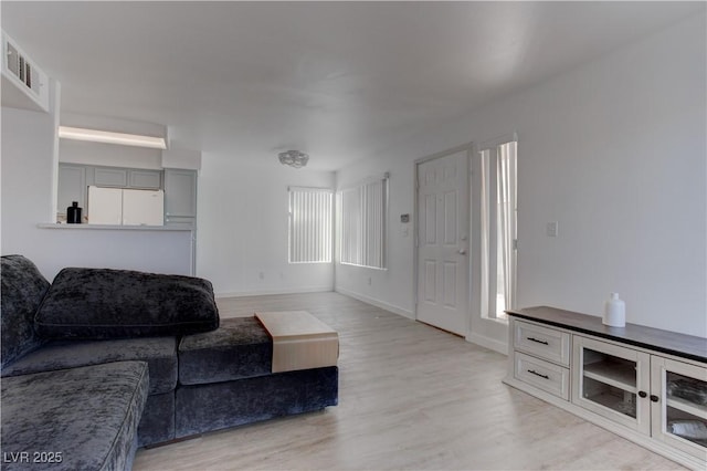 3103 Key Largo Dr Unit 103, Las Vegas, NV 89120 - living area with light wood finished floors and baseboards