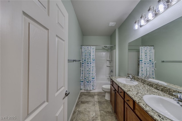 2099 Port Royal Dr, Laughlin, NV 89029 - bathroom featuring double vanity, toilet, shower / tub combo, and baseboards