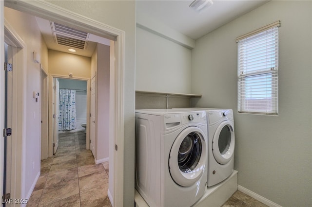 2099 Port Royal Dr, Laughlin, NV 89029 - laundry area with washer and dryer and baseboards
