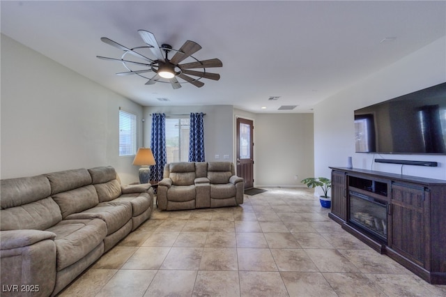 2099 Port Royal Dr, Laughlin, NV 89029 - living area featuring ceiling fan, light tile patterned flooring, and baseboards