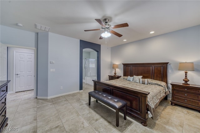 2099 Port Royal Dr, Laughlin, NV 89029 - bedroom featuring arched walkways, a ceiling fan, recessed lighting, baseboards, and connected bathroom