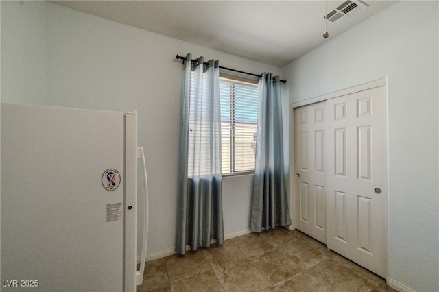 2099 Port Royal Dr, Laughlin, NV 89029 - unfurnished bedroom with baseboards and a closet