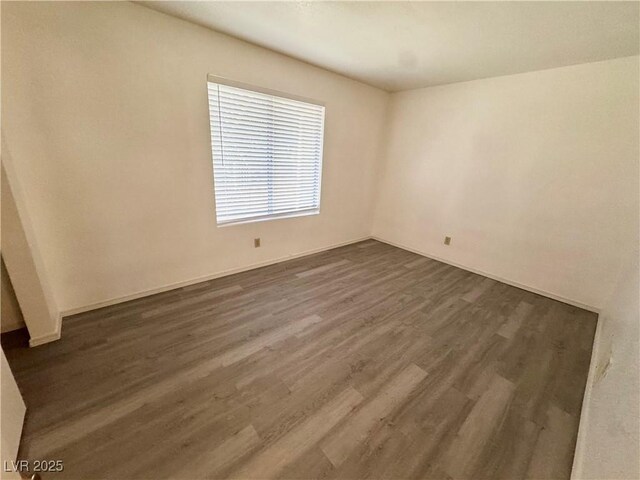 2064 Mesquite Ln Unit 102, Laughlin, NV 89029 - empty room featuring dark wood-style floors