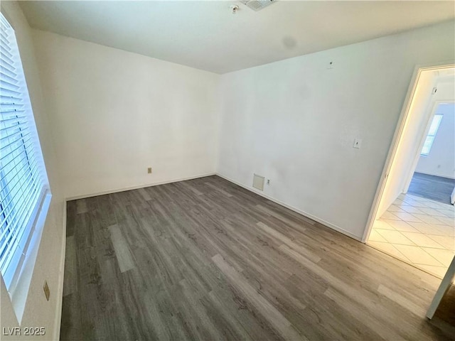 2064 Mesquite Ln Unit 102, Laughlin, NV 89029 - empty room featuring wood finished floors and baseboards