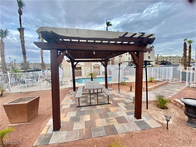 2064 Mesquite Ln Unit 102, Laughlin, NV 89029 - view of patio / terrace featuring a pergola