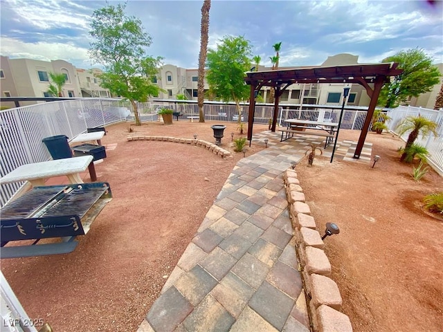 2064 Mesquite Ln Unit 102, Laughlin, NV 89029 - view of community featuring a pergola and a patio area