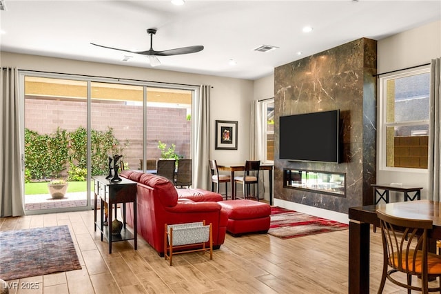3395 Stone View Ave, Henderson, NV 89044 - living room featuring a ceiling fan, wood finished floors, and recessed lighting