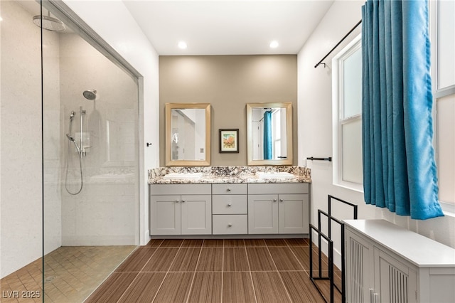 3395 Stone View Ave, Henderson, NV 89044 - bathroom with a walk in shower, double vanity, and recessed lighting