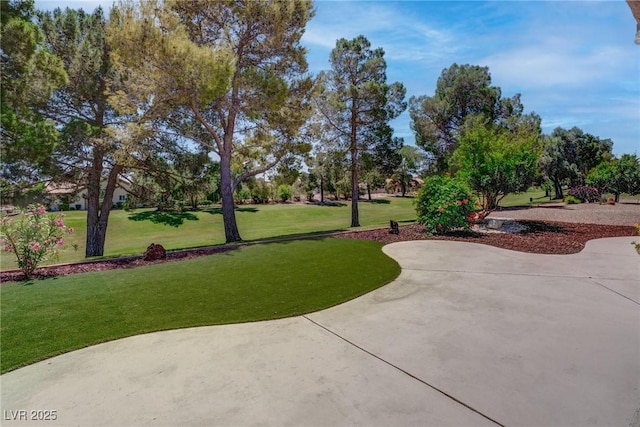 3040 Hidden Treasure Dr, Las Vegas, NV 89134 - view of community with a yard and a patio
