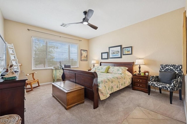 2453 Vivid Sky Pl, Henderson, NV 89044 - bedroom featuring light carpet, a ceiling fan, and baseboards