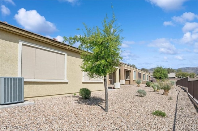 2453 Vivid Sky Pl, Henderson, NV 89044 - view of side of property with cooling unit and stucco siding