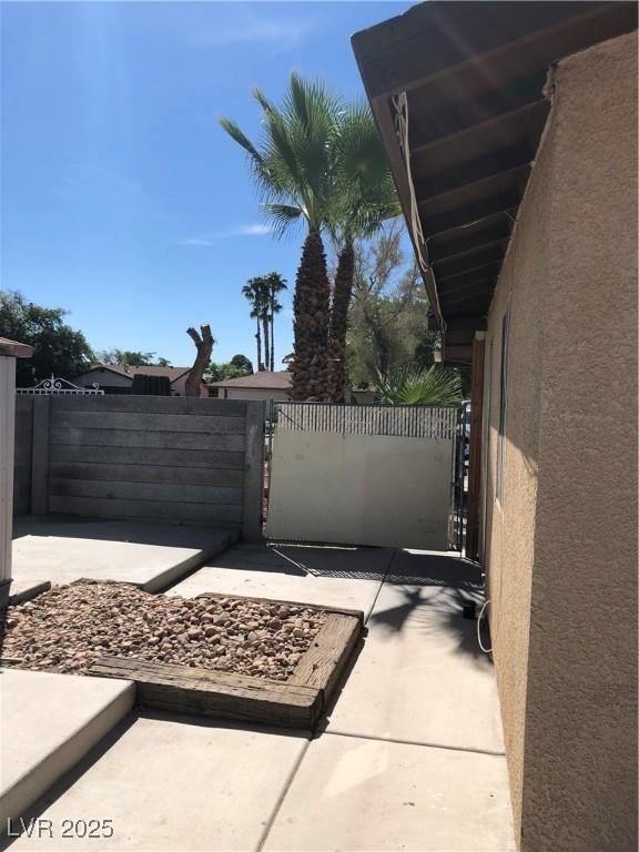 6196 W University Ave, Las Vegas, NV 89103 - view of patio featuring a gate