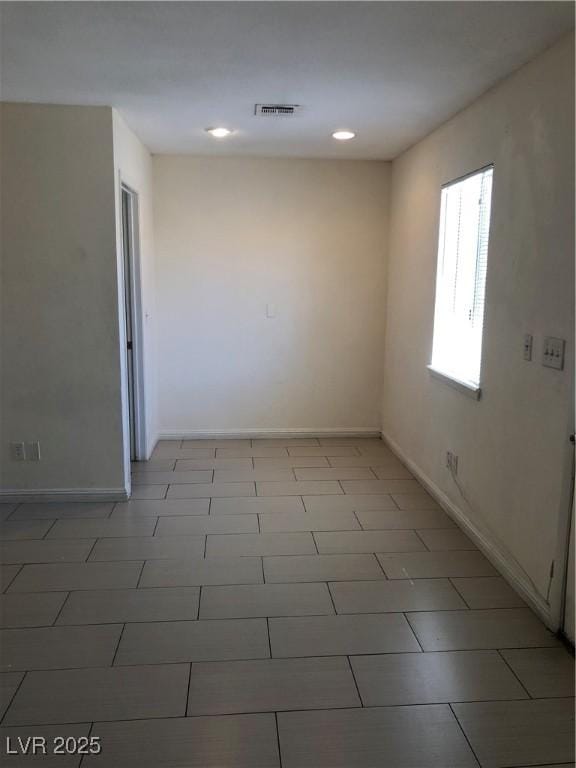 6196 W University Ave, Las Vegas, NV 89103 - unfurnished room with baseboards and recessed lighting