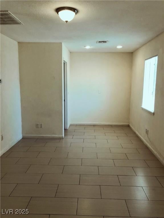 6196 W University Ave, Las Vegas, NV 89103 - empty room with baseboards