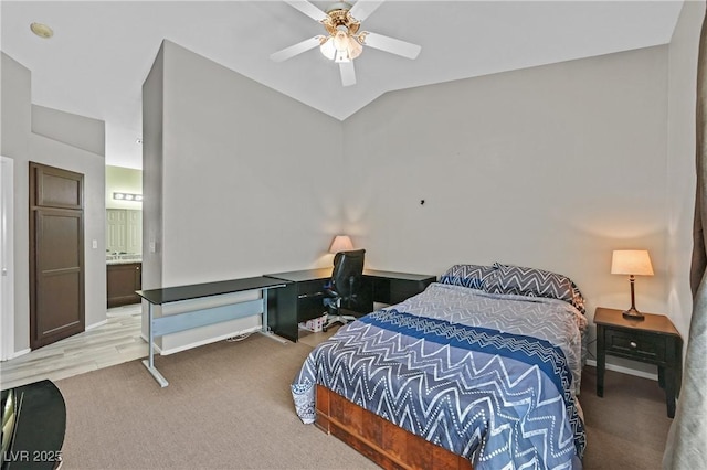 6125 Desert Haven Rd, Las Vegas, NV 89130 - bedroom featuring light carpet, lofted ceiling, a desk, ceiling fan, and ensuite bathroom