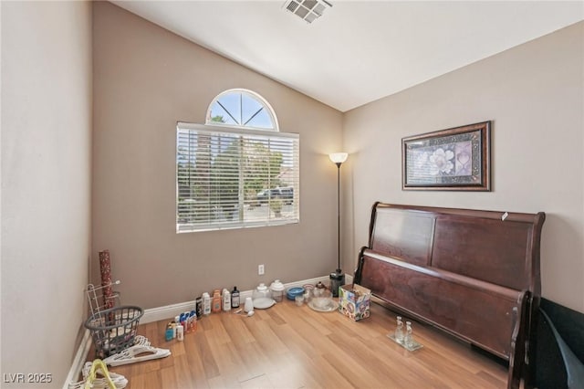 628 Bay Bridge Dr, North Las Vegas, NV 89032 - unfurnished bedroom featuring wood finished floors, baseboards, and lofted ceiling