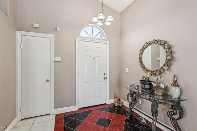 628 Bay Bridge Dr, North Las Vegas, NV 89032 - tiled foyer featuring baseboards, a chandelier, and high vaulted ceiling