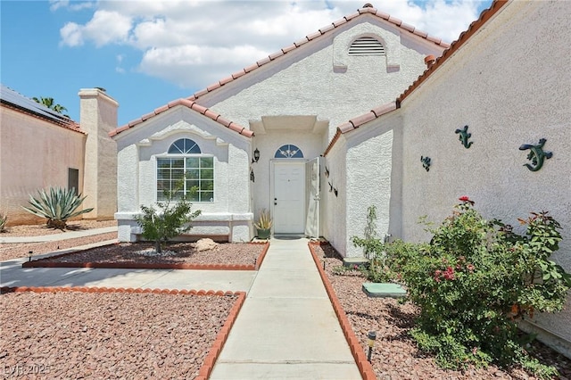 628 Bay Bridge Dr, North Las Vegas, NV 89032 - view of front of home with a tiled roof and stucco siding