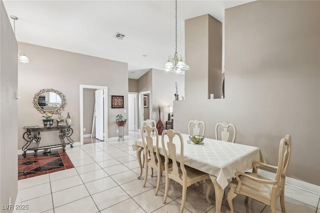 628 Bay Bridge Dr, North Las Vegas, NV 89032 - dining room featuring light tile patterned floors, a chandelier, and baseboards