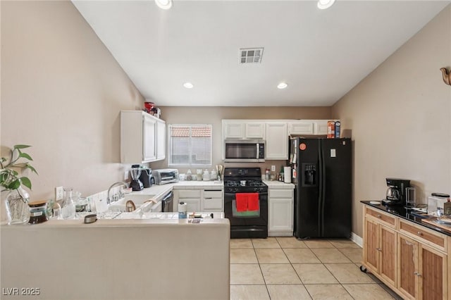 628 Bay Bridge Dr, North Las Vegas, NV 89032 - kitchen featuring black appliances, a sink, light tile patterned flooring, white cabinets, and recessed lighting