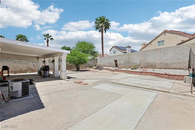 628 Bay Bridge Dr, North Las Vegas, NV 89032 - fenced backyard featuring central AC unit, a patio area, and grilling area