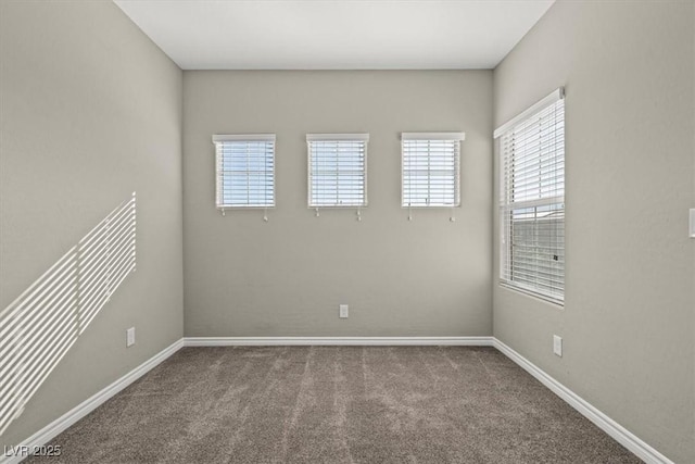 7051 Denio Island St, North Las Vegas, NV 89084 - carpeted empty room featuring baseboards