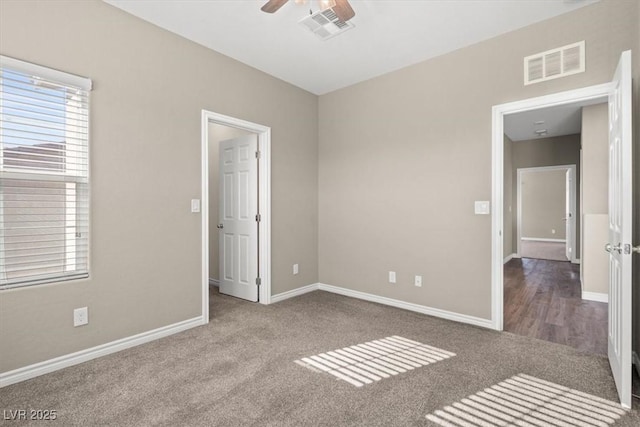 7051 Denio Island St, North Las Vegas, NV 89084 - unfurnished bedroom featuring carpet flooring, baseboards, and ceiling fan