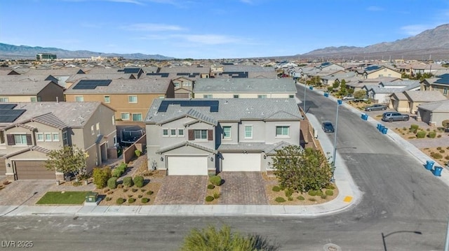 7051 Denio Island St, North Las Vegas, NV 89084 - aerial perspective of suburban area featuring a mountainous background