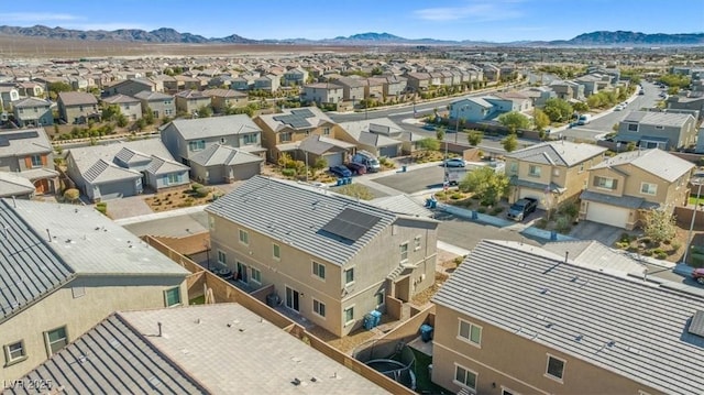 7051 Denio Island St, North Las Vegas, NV 89084 - aerial perspective of suburban area with mountains