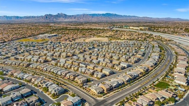 7051 Denio Island St, North Las Vegas, NV 89084 - aerial view of property's location with nearby suburban area and a mountain backdrop