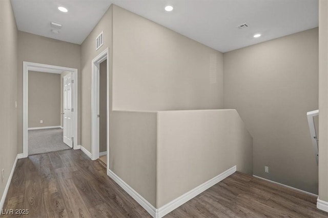 7051 Denio Island St, North Las Vegas, NV 89084 - hall with wood finished floors, baseboards, and recessed lighting