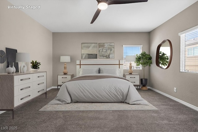 7051 Denio Island St, North Las Vegas, NV 89084 - bedroom featuring dark colored carpet, baseboards, and ceiling fan