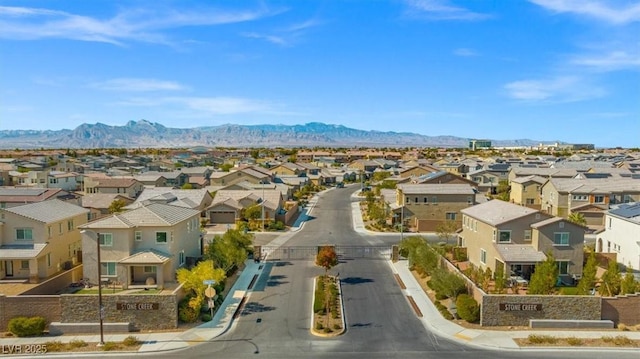 7051 Denio Island St, North Las Vegas, NV 89084 - aerial perspective of suburban area with mountains