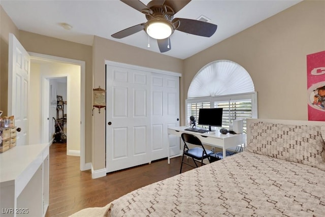 8224 Fawn Meadow Ave, Las Vegas, NV 89149 - bedroom featuring wood finished floors, a closet, ceiling fan, and baseboards