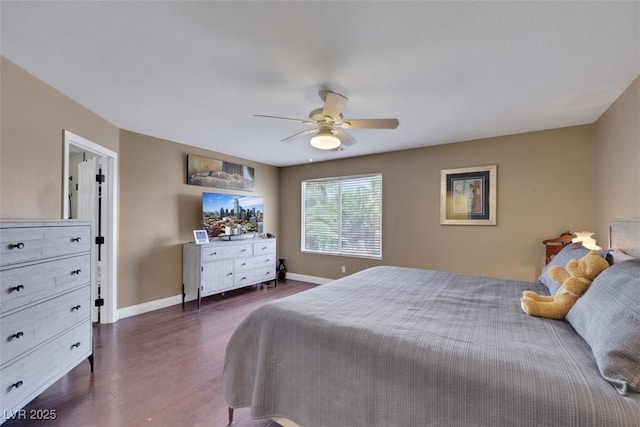 8224 Fawn Meadow Ave, Las Vegas, NV 89149 - bedroom with dark wood-style flooring, baseboards, and a ceiling fan