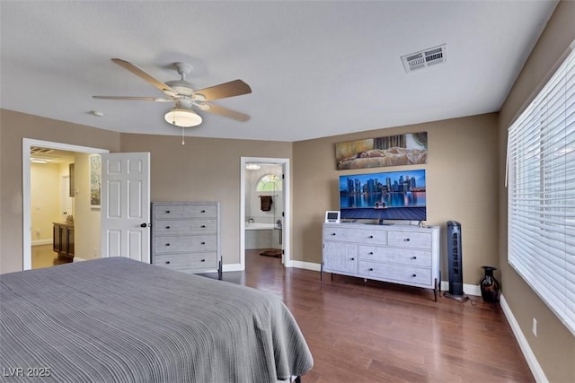 8224 Fawn Meadow Ave, Las Vegas, NV 89149 - bedroom with wood finished floors, connected bathroom, baseboards, and a ceiling fan