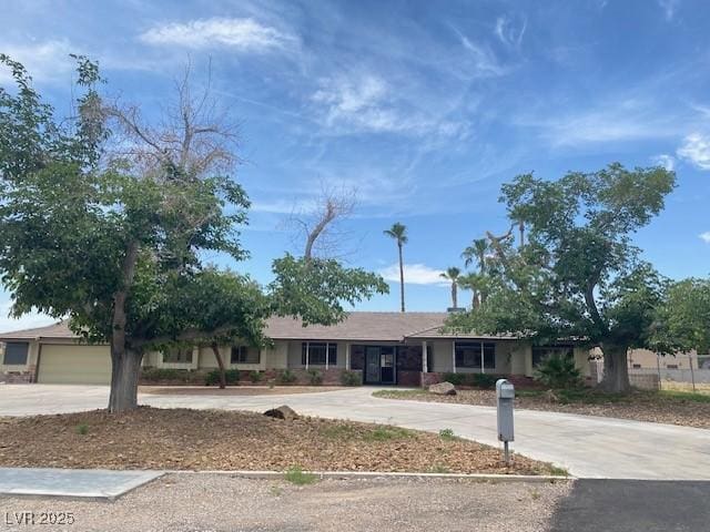 6315 Eldora Ave, Las Vegas, NV 89146 - ranch-style house with curved driveway
