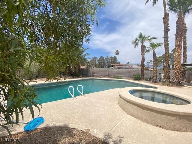 6315 Eldora Ave, Las Vegas, NV 89146 - view of swimming pool featuring a fenced backyard, a patio, and a pool with connected hot tub