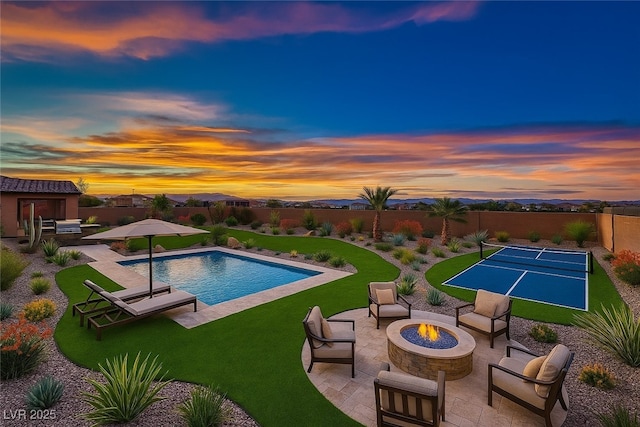 4740 W Agate Ave, Las Vegas, NV 89139 - view of pool featuring an outdoor fire pit and a patio area