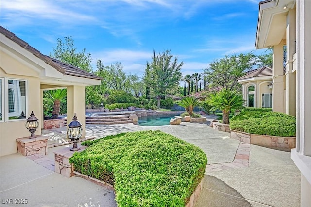 1809 White Hawk Ct, Las Vegas, NV 89134 - view of yard featuring a patio area and an outdoor pool